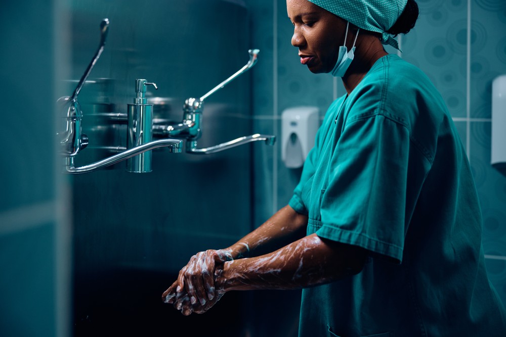black-female-doctor-washing-hands-before-surgery-i-2023-12-05-15-53-34-utc.jpg